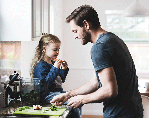 Father cooks with daughter