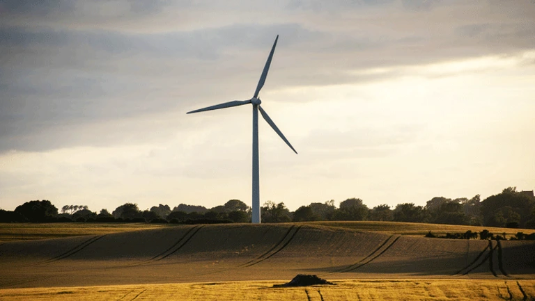 Windmill on field
